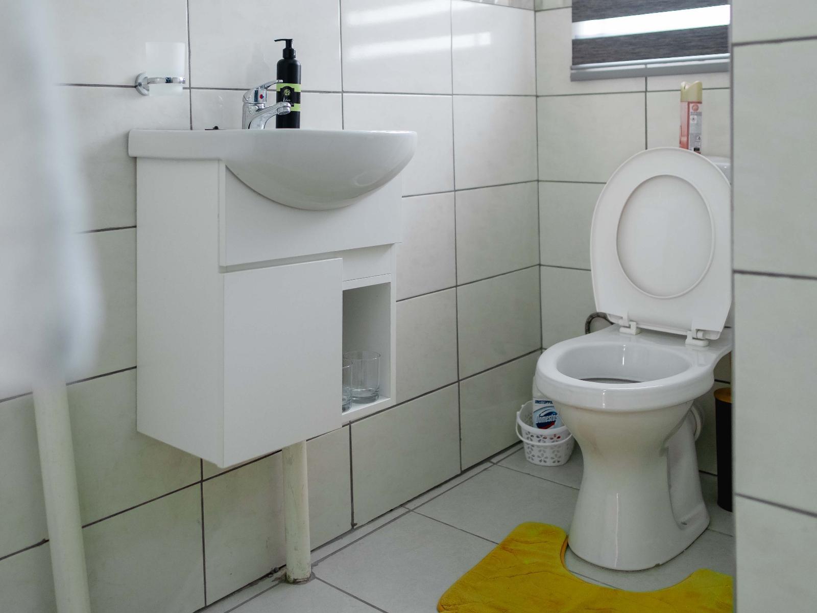 Bathroom — yellow mat